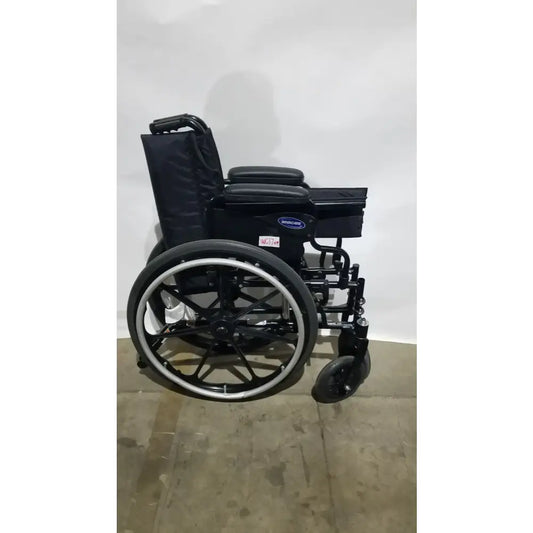 Reuse Medical Equipment Invacare Tracer SX5 Folding Wheelchair – Black Finish with Padded Arm Supports Wheelchairs, second-hand product photo 1