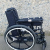 Invacare Tracer SX5 Heavy-Duty Black Wheelchair with Fixed Arm Rests