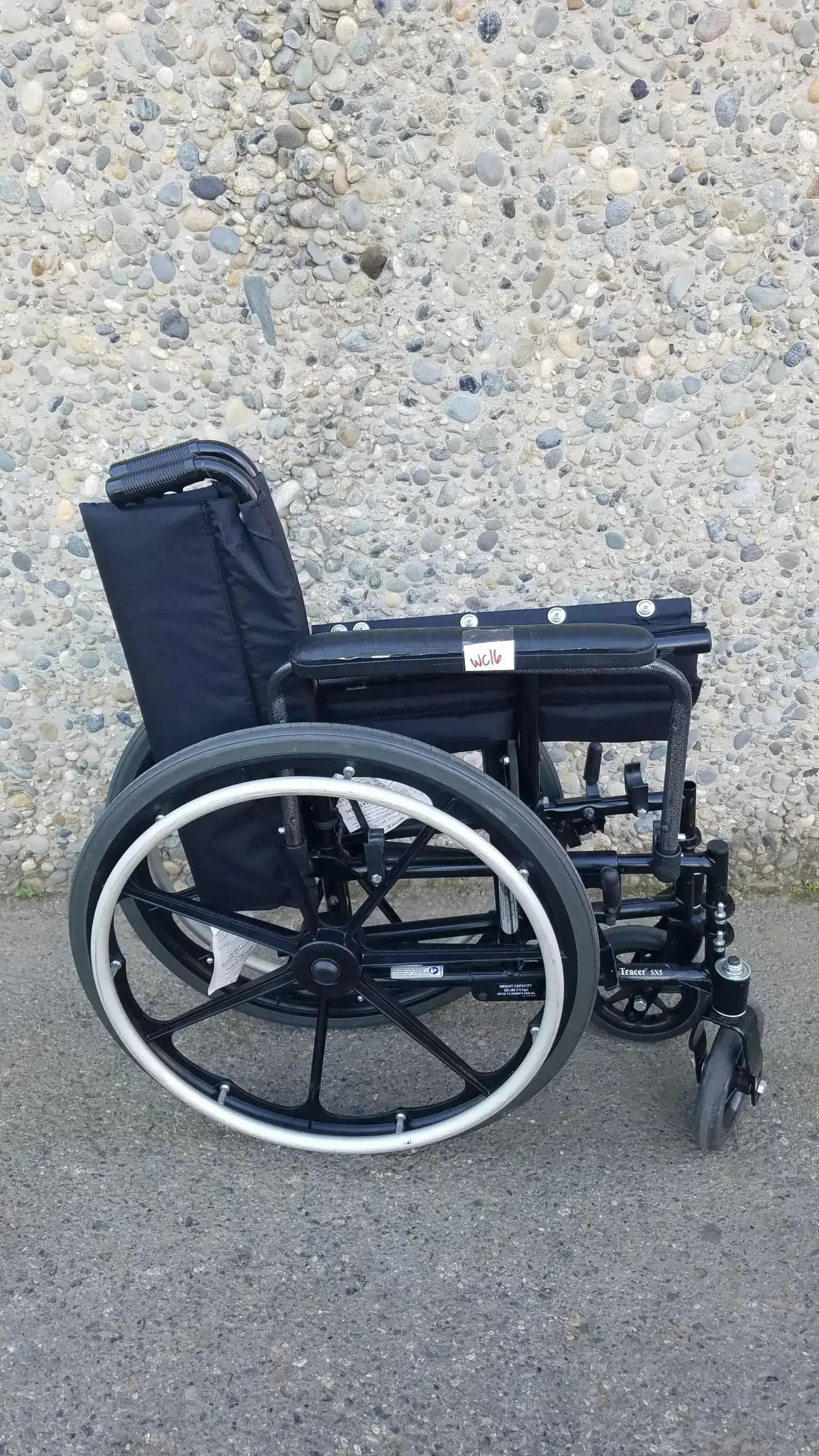 Reuse Medical Equipment Invacare Tracer SX5 Heavy-Duty Black Wheelchair with Fixed Arm Rests Wheelchairs, second-hand product photo 1