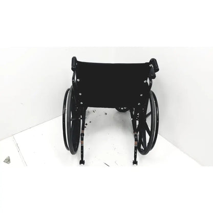 Black metal invacare tracer sx5 manual wheelchair with black fabric seat and backrest designed for adult use