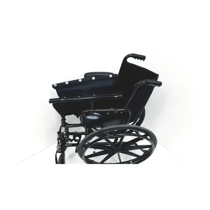 Black metal invacare tracer sx5 manual wheelchair with padded seat and backrest featuring sturdy folding design