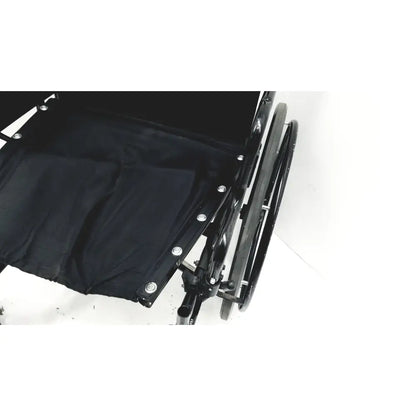 Invacare tracer sx5 manual wheelchair with black fabric seat and silver rivets on black metal frame for adults standard folding