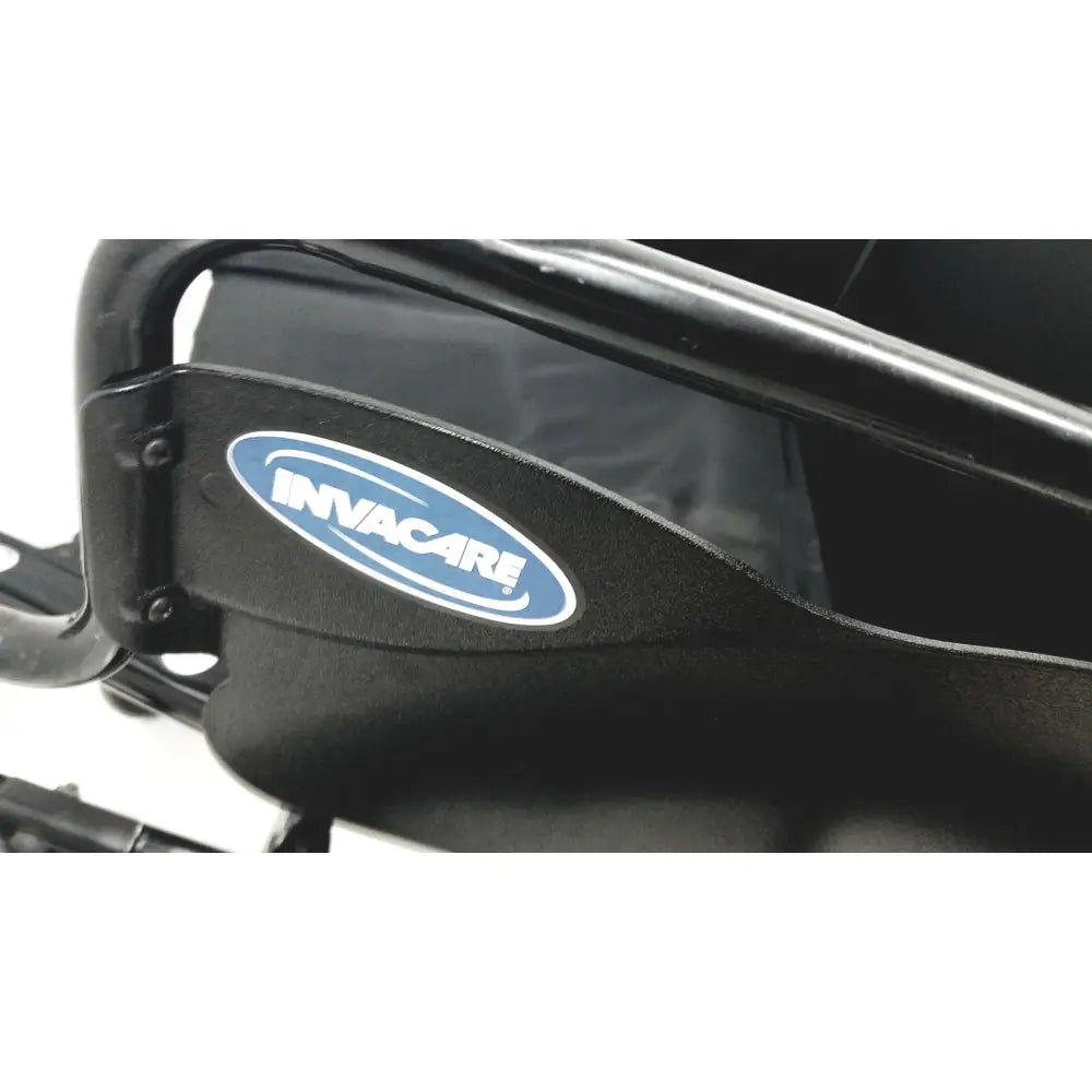 Black invacare tracer sx5 manual wheelchair frame with glossy finish and oval blue and white logo for adults standard folding model
