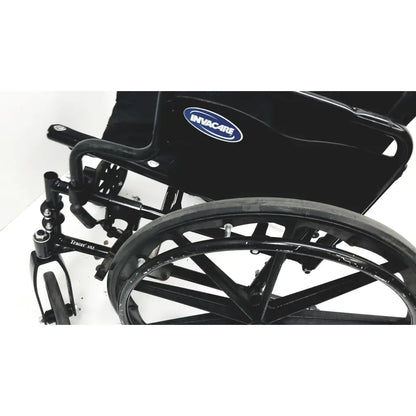 Invacare tracer sx5 manual wheelchair in black with chrome metal frame and large durable rubber tires for adults standard folding
