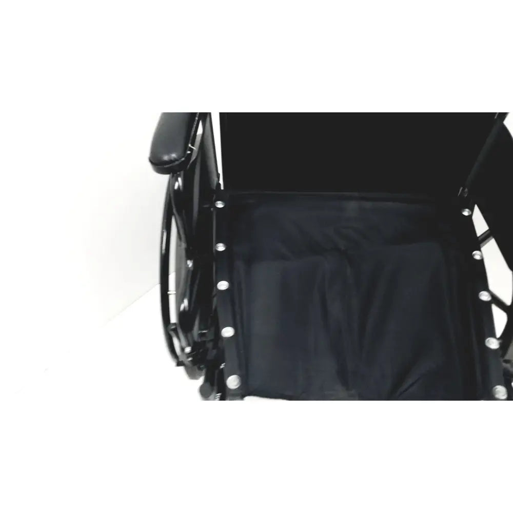 Black invacare tracer sx5 manual wheelchair with padded seat and armrests for adult standard folding use