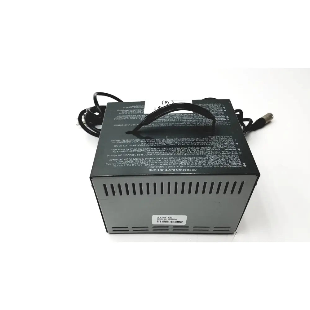 Black and gray invacare wheelchair 24 volt automatic battery charger with coiled cable and ventilation slots on the side