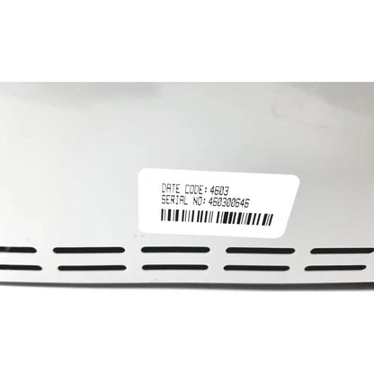 White rectangular label with black text and barcode on white surface of invacare wheelchair 24 volt automatic battery charger