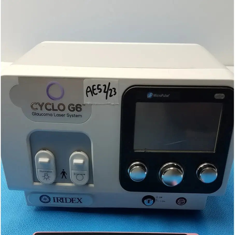 White iridex cyclo g6 ophthalmic laser console with black control panel and silver knobs for glaucoma treatment