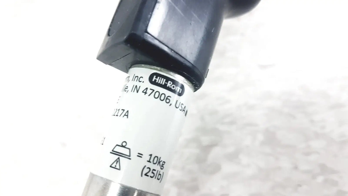 Black plastic sensor head with white hillrom inc label for reuse medical iv pole compatible with hillrom p2217a