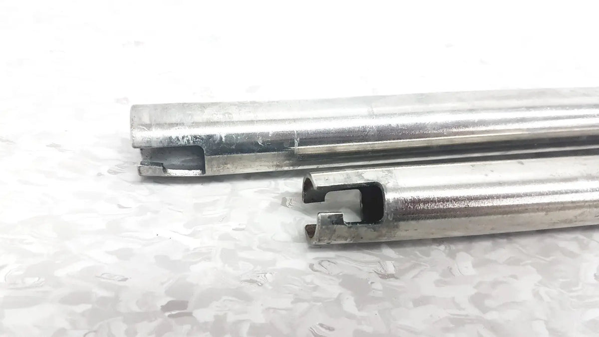Two metallic cylindrical rods with cut-out ends for iv pole compatible with hillrom p2217a reuse medical equipment
