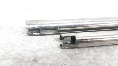 Two metallic cylindrical rods with cut-out ends for iv pole compatible with hillrom p2217a reuse medical equipment