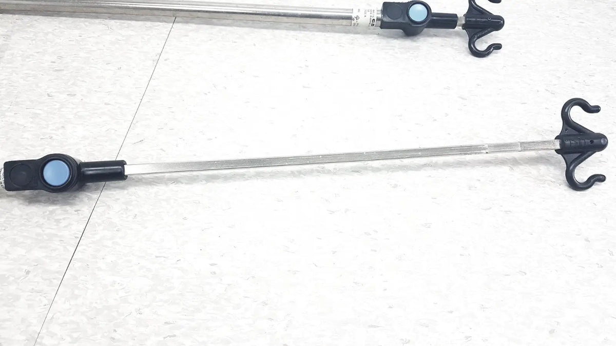 Silver metal iv pole bed rail with black plastic hooks and blue accents compatible with hillrom p2217a reuse medical