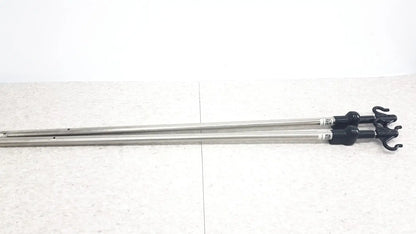 Two metallic iv pole poles with black plastic hooks compatible with hillrom p2217a for reuse medical purposes