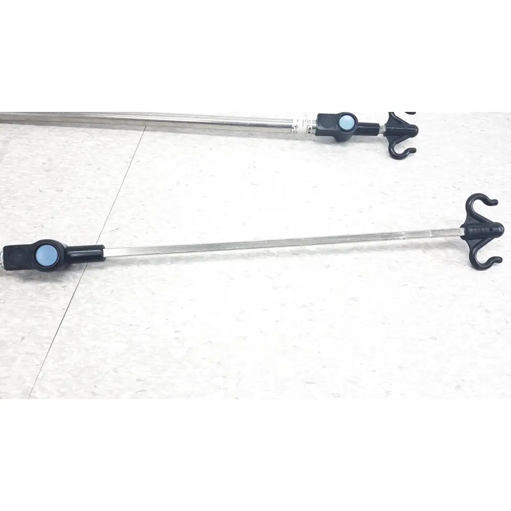 Silver metal iv pole bed rail with black plastic hooks and blue accents compatible with hillrom p2217a reuse medical