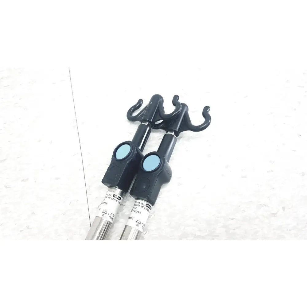 Black plastic hook extenders with light blue buttons and metallic shafts for reuse medical hillrom p2217a iv pole