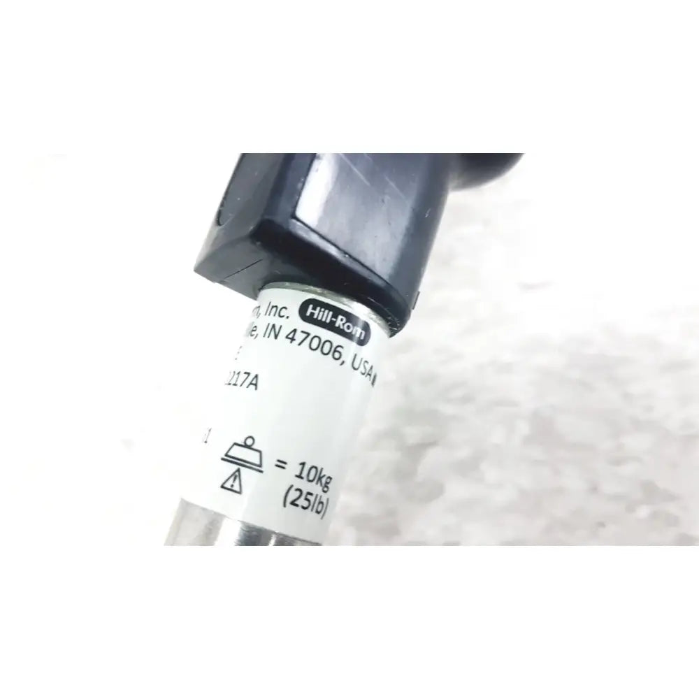 Black plastic sensor head with white hillrom inc label for reuse medical iv pole compatible with hillrom p2217a