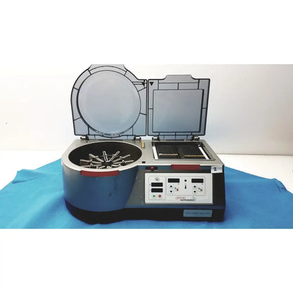 Gray and black laboratory centrifuge with transparent lid labeled ortho workstation for diagnostic ivd ortho use