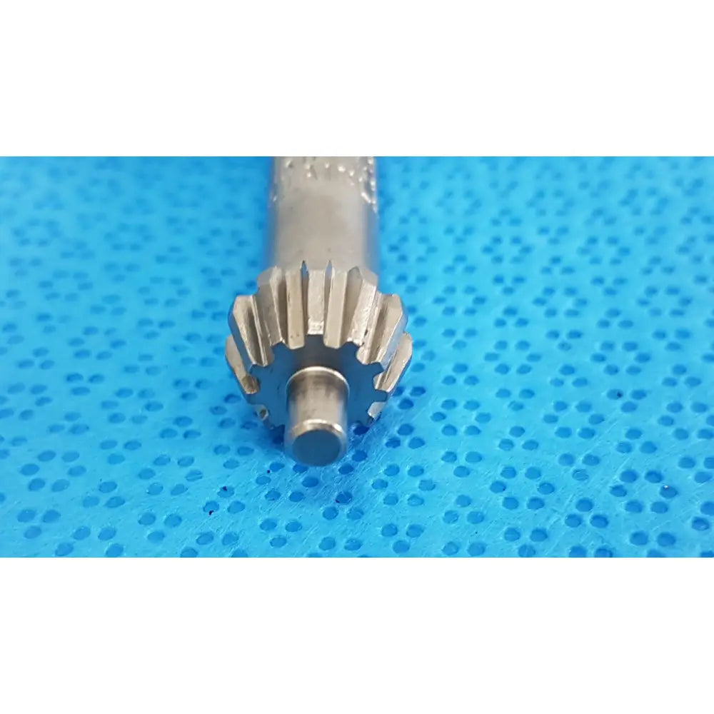 Silver metallic gear with evenly spaced teeth and cylindrical shaft for jacobs kim key 1m stainless precision chuck key
