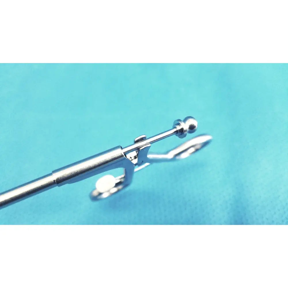 Jarit 600-400 stainless steel laparoscopiic clamp with a sleek polished finish and ball-shaped tip in silver steel