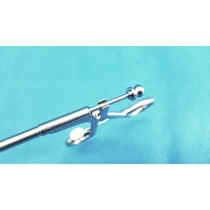 Jarit 600-400 stainless steel laparoscopiic clamp with a sleek polished finish and ball-shaped tip in silver steel