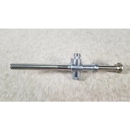 Silver-colored metal piston valve cannula with long cylindrical shaft and cross-shaped handle for surgical use