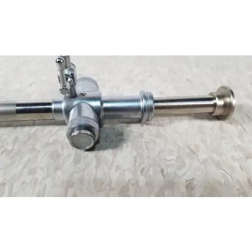 Silver metallic jarit 600-440 piston valve cannula with cylindrical body knurled knobs and threaded connectors