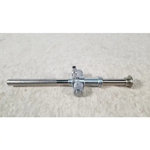 Silver metallic Jarit 600-440 piston valve cannula with long shaft and central crossbar featuring multiple ports and knobs