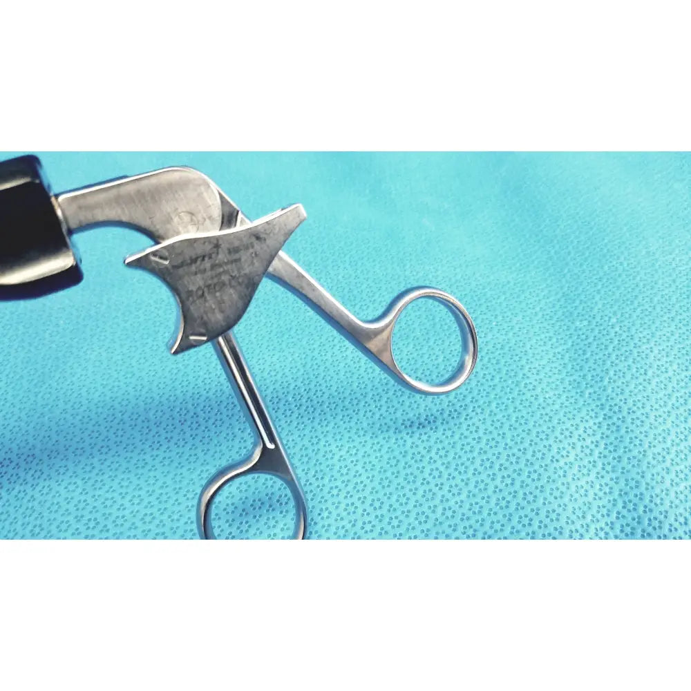 Jarit 610-140 roto-lok stainless steel surgical instrument with silver body black handle and engraved markings