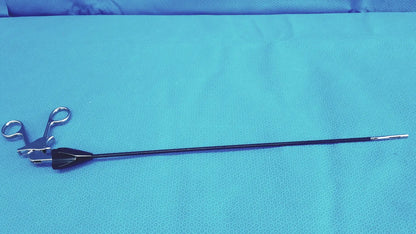 Black-handled jarit 610-140 stainless steel roto-lok surgical instrument with scissor-like jaws and slender shaft