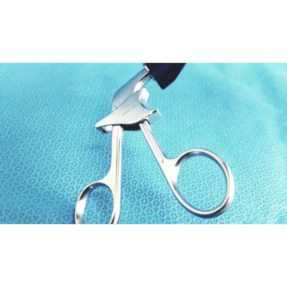Silver metal eyelash curler with black ergonomic handle featuring jarit stainless steel roto-lok design