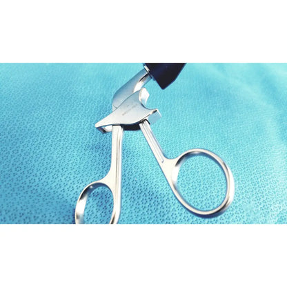 Silver metal eyelash curler with black ergonomic handle featuring jarit stainless steel roto-lok design