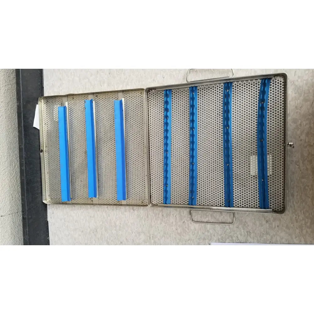 Jarit stainless steel 37988a sterilization case with blue plastic dividers for organized surgical instrument storage
