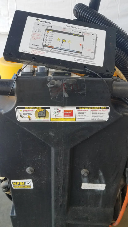 Black plastic control panel with digital display and instructional labels on kaivac wet dry vacuum cleaning system
