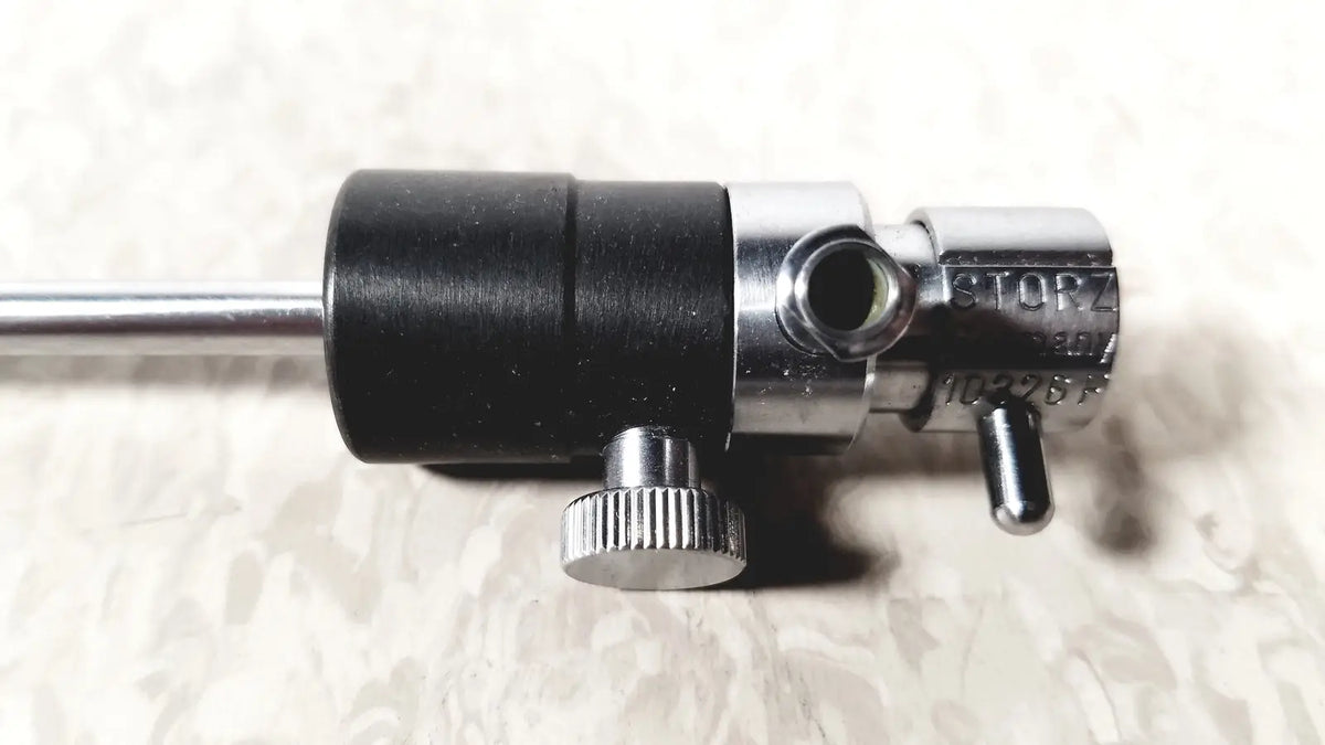 Strozz 10326f adult optical stylet sheath with black cylindrical body and silver metallic fittings featuring engraved markings