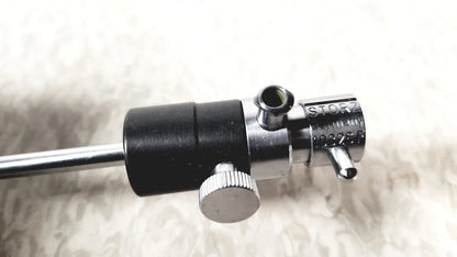 Silver and black metal medical instrument with textured knob featuring storz germany branding for storz 10326f adult use