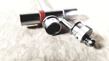 Silver-colored metal xlr audio connectors with red band and threaded locking on the back of karl storz 10338c surgical bronchoscope sheath