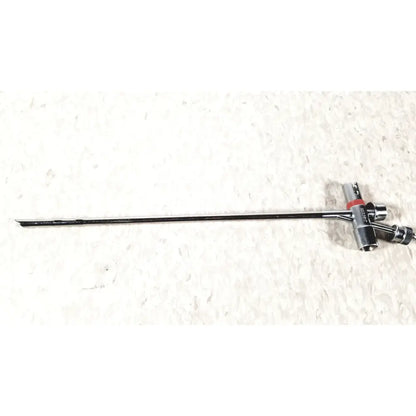 Black metal storz 10338c surgical bronchoscope sheath with long slender shaft and red-accented complex handle assembly