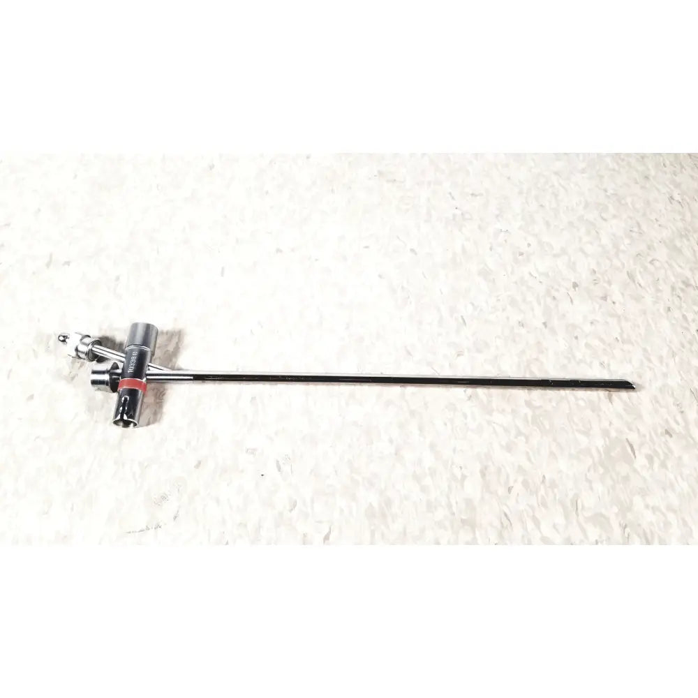 Black and silver storz 10338c surgical bronchoscope sheath with slender elongated shaft and articulated control handles