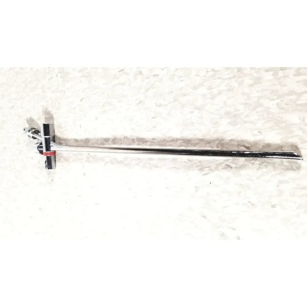 Silver-colored metal storz 10338c surgical bronchoscope scope sheath with long slender shaft and t-shaped handle with red accents