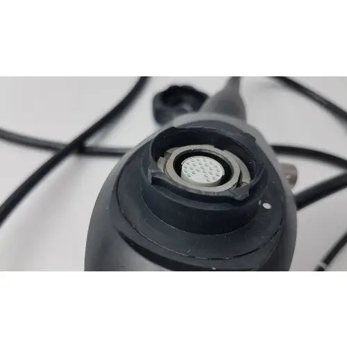 Black karl storz 11272vnu flexible video endoscope with circular textured lens port and metallic ring detail
