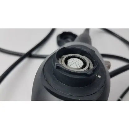 Black karl storz 11272vnu flexible video endoscope with circular textured lens port and metallic ring detail