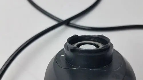 Black plastic camera lens mount with circular rubber gasket and threaded ring on back side of karl storz 11272vnu video endoscope