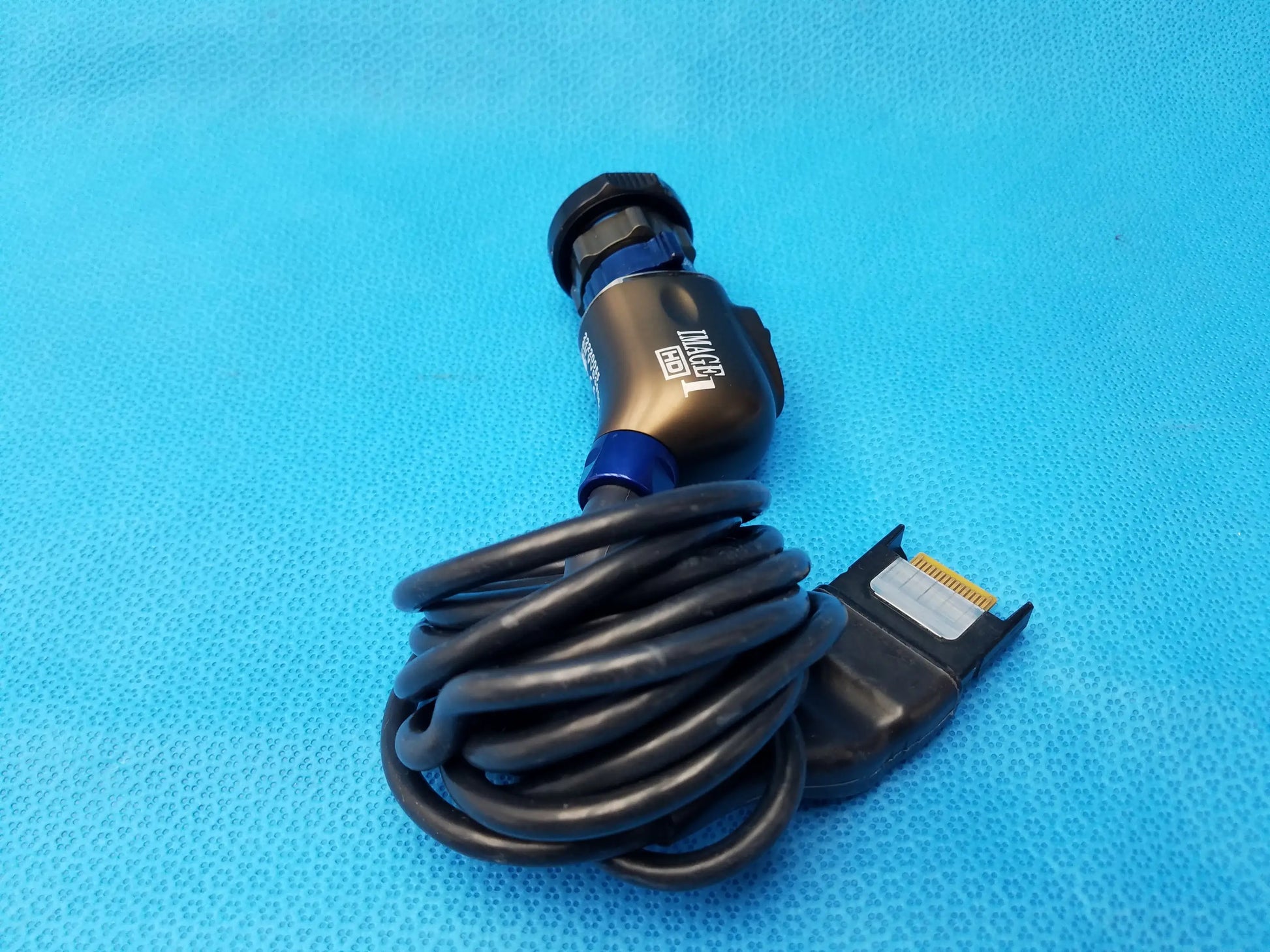 Black and blue usb to 30 pin adapter cable with coiled black cord for karl storz camera head precision imaging component