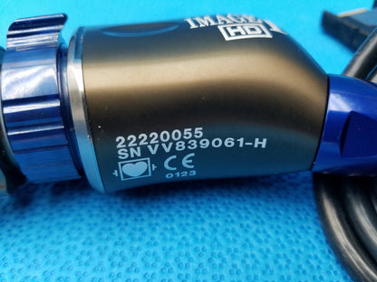 Blue and black karl storz camera head with textured grip and image hd branding precision imaging component