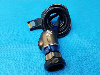 Karl storz black and blue precision imaging component camera head with coiled cable and metallic housing labeled image