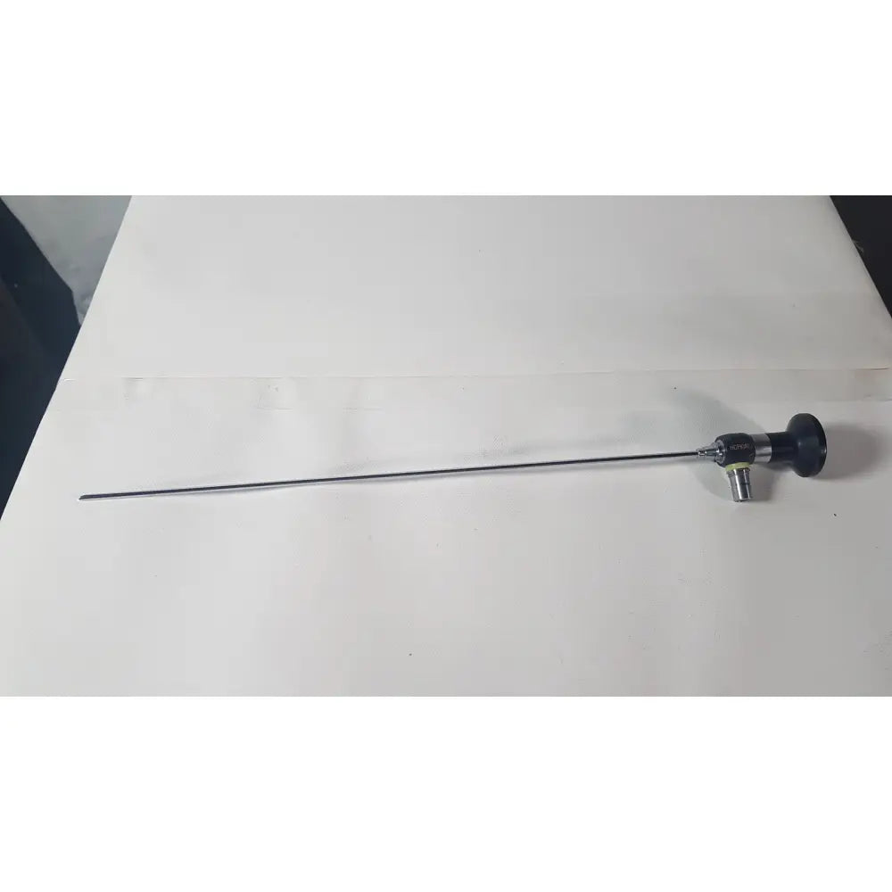 Black-handled karl storz 27020 c hopkins 70 degree cystoscope with metallic shaft and camera lens for reuse medical use