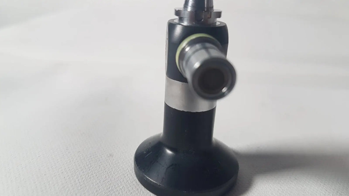 Black and silver karl storz 27020 c hopkins 70 degree cystoscope with cylindrical nozzle and metallic fittings for reuse medical use