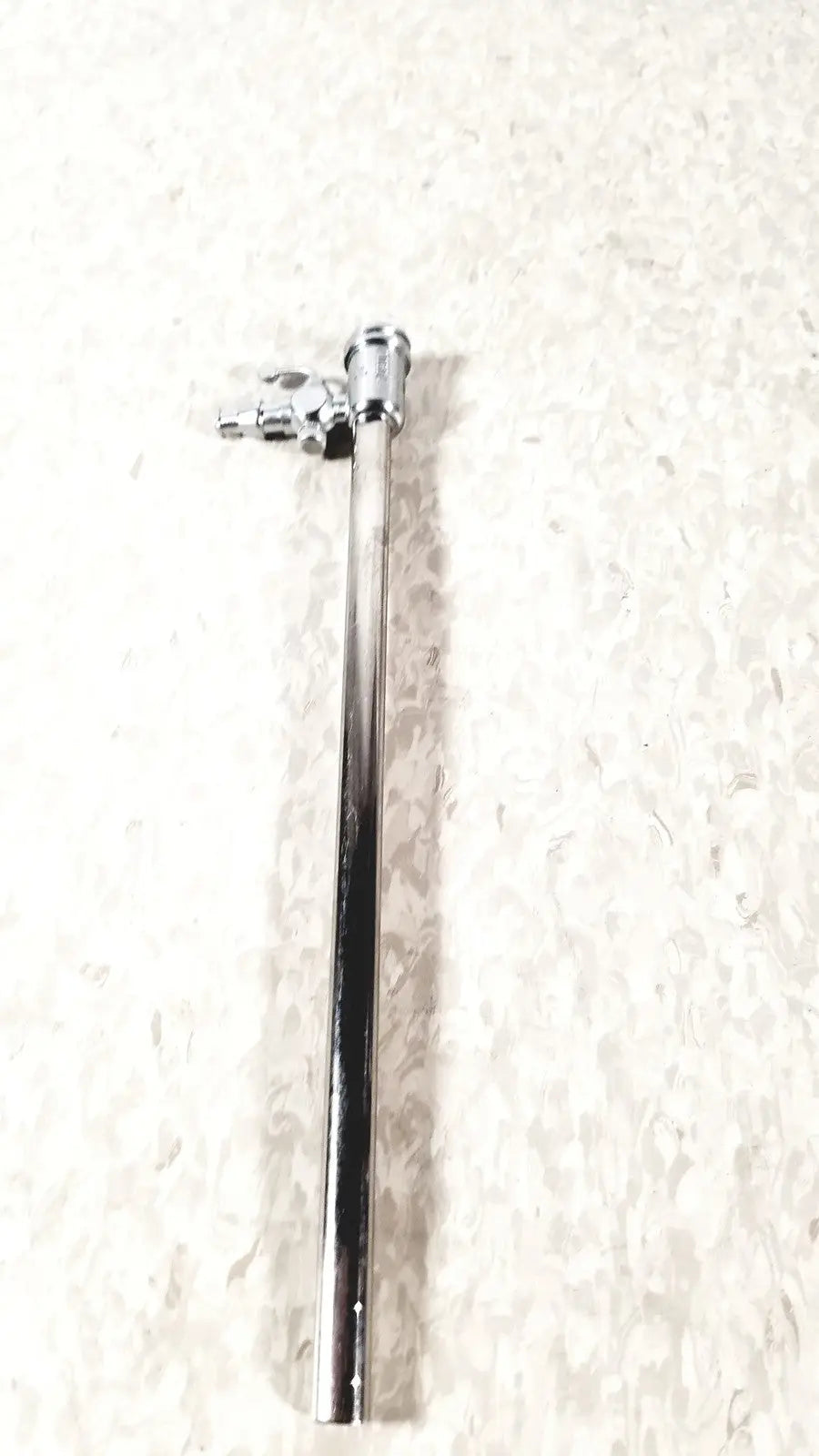 Chrome-finished metal pipe with threaded valve top of karl storz 27090j endoscope obturator for medical use