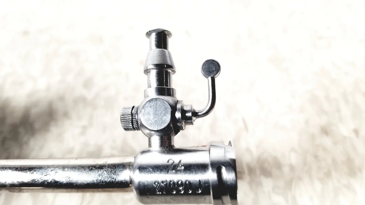 Silver metallic gas valve with knurled adjustment knob and curved lever handle for karl storz 27090j endoscope obturator