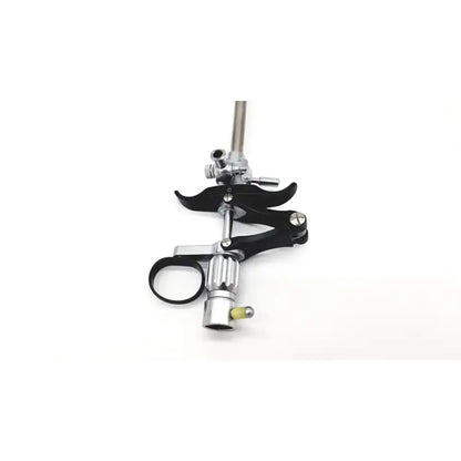 Black and silver karl storz 27094p optical kidney stone grasper with curved handle and adjustable clamping mechanism